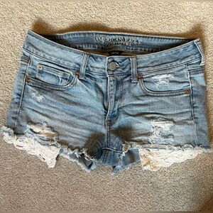 American Eagle Stretch Shortie Shorts with decorative pockets